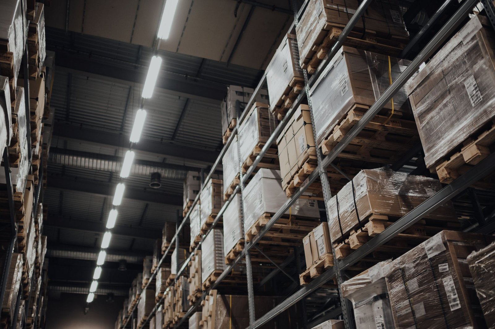Warehouse racking stacked with boxed stock